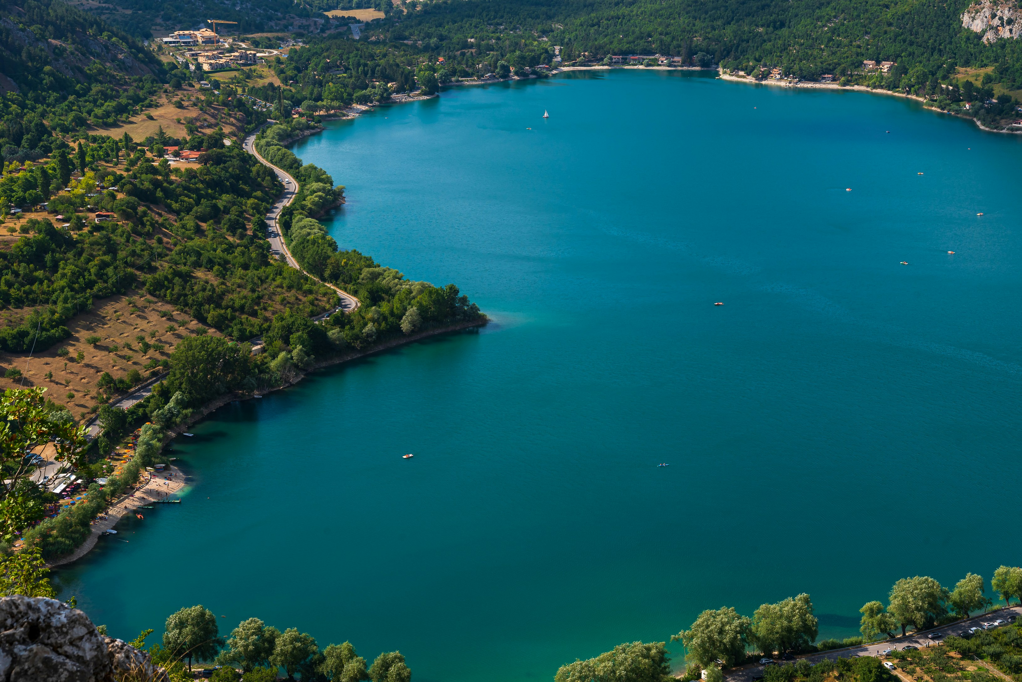 aerial view of green trees and blue sea during daytime